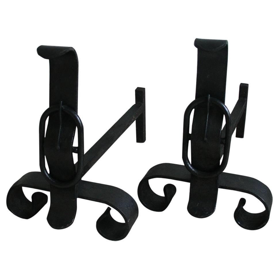 Pair of French Wrought Iron Fire Dogs/Andirons with Large Buckle Detail For Sale