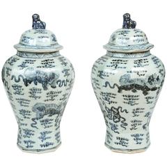 Pair of Vintage Chinese Ginger Jars with Foo Dogs and Clouds