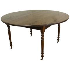 Round Laburnum Dining Table, Turned Legs on Castors