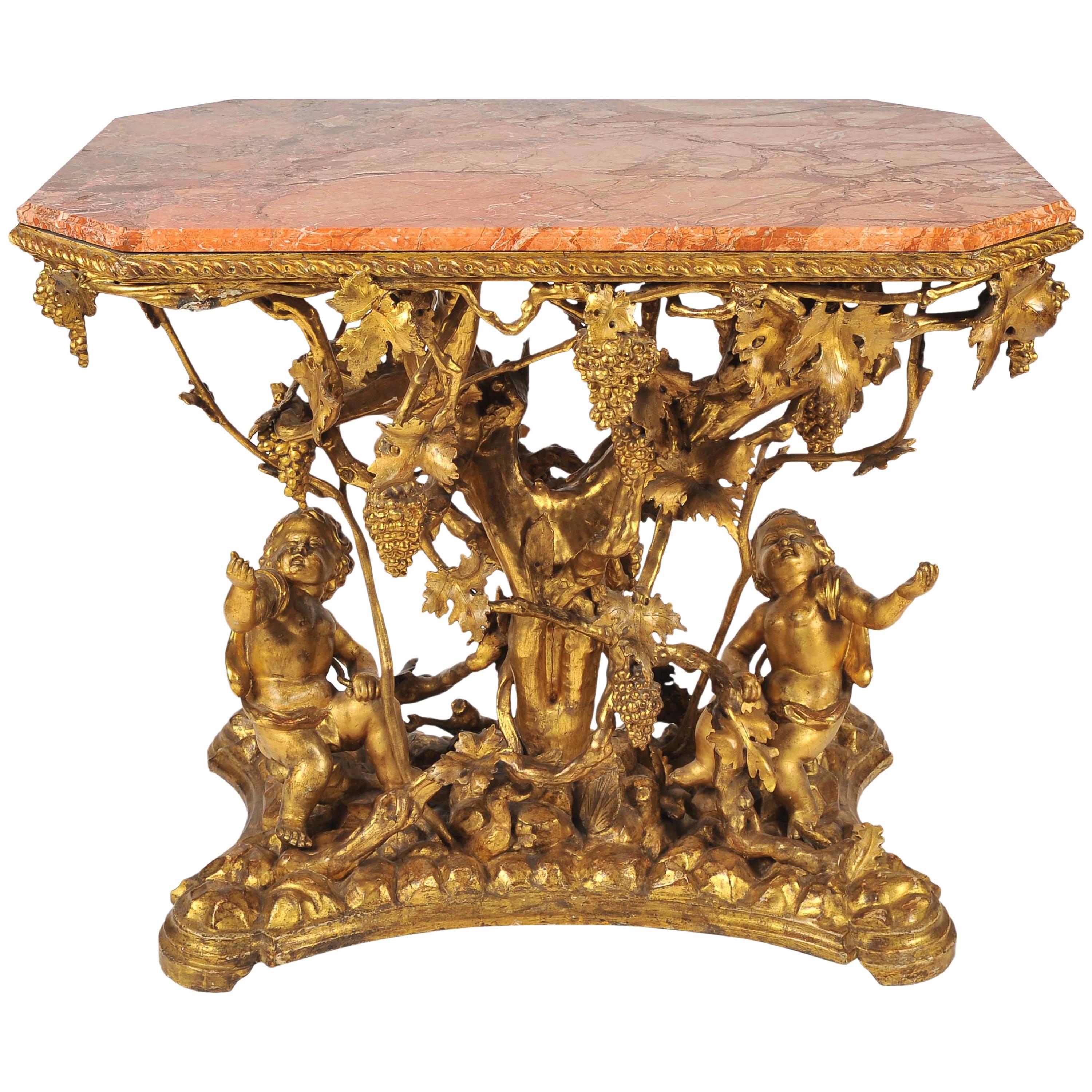 19th Century Italian Gilt Wine Table, Pink Marble Top, Putti, Vines and Grapes For Sale