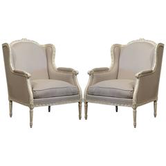 Pair of 19th Century French Louis XVI Carved Painted Armchairs with Shaped Ears