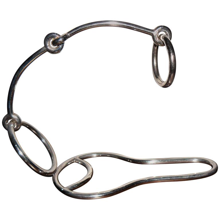 A Cartier Silver Belt Strap Wine Holder at 1stdibs