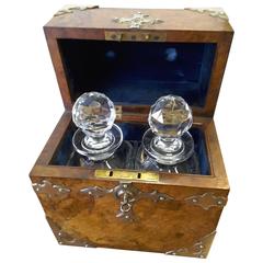 A Burl Walnut and Brass Mounts Gothic Style Decanter Set, London