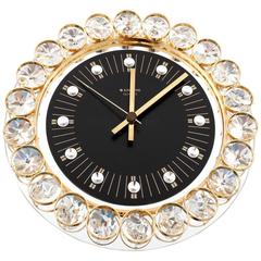 Horloge murale Junghans:: Allemagne:: miroir en cristal doré:: 1970