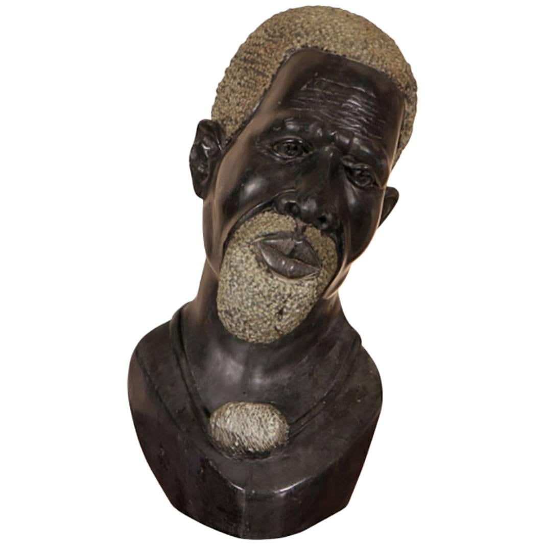 Carved Black Stone Bust of a Tribal Bearded Elder