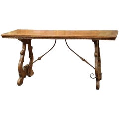 19th Century Spanish Carved Chestnut Table with Wrought Iron Stretcher 19th Century Spanish Carved Chestnut Table with Wrought Iron Stretcher