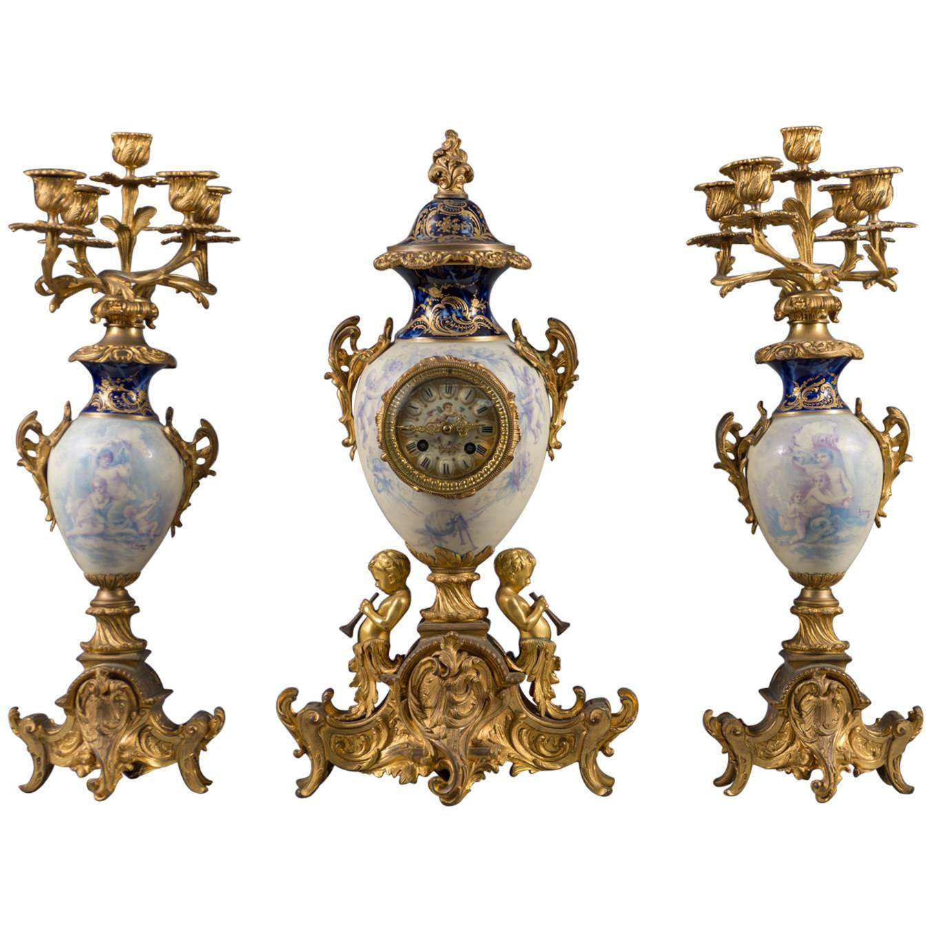 19th Century French Gilt Bronze and White Porcelain Three-Piece Garniture Set