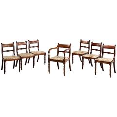 Set of seven Regency period (six plus one) mahogany chairs 