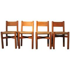Set of Four Charlotte Perriand "Meribel" Wood & Rattan Chairs