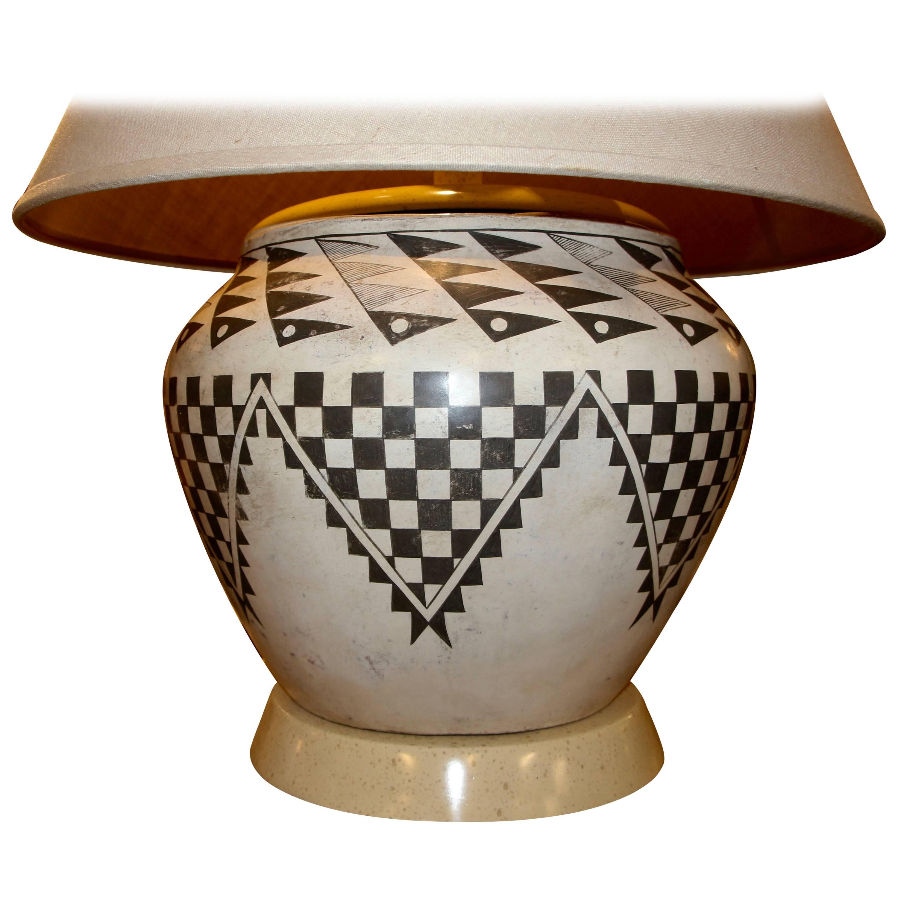 A spectacular Acoma Tularosa piece of pottery, in the style of Lucy Lewis, the renown Native American potter. As her works were signed on the base, we did not take the lamp apart to check for certain, but it most certainly looks like her work. Steve