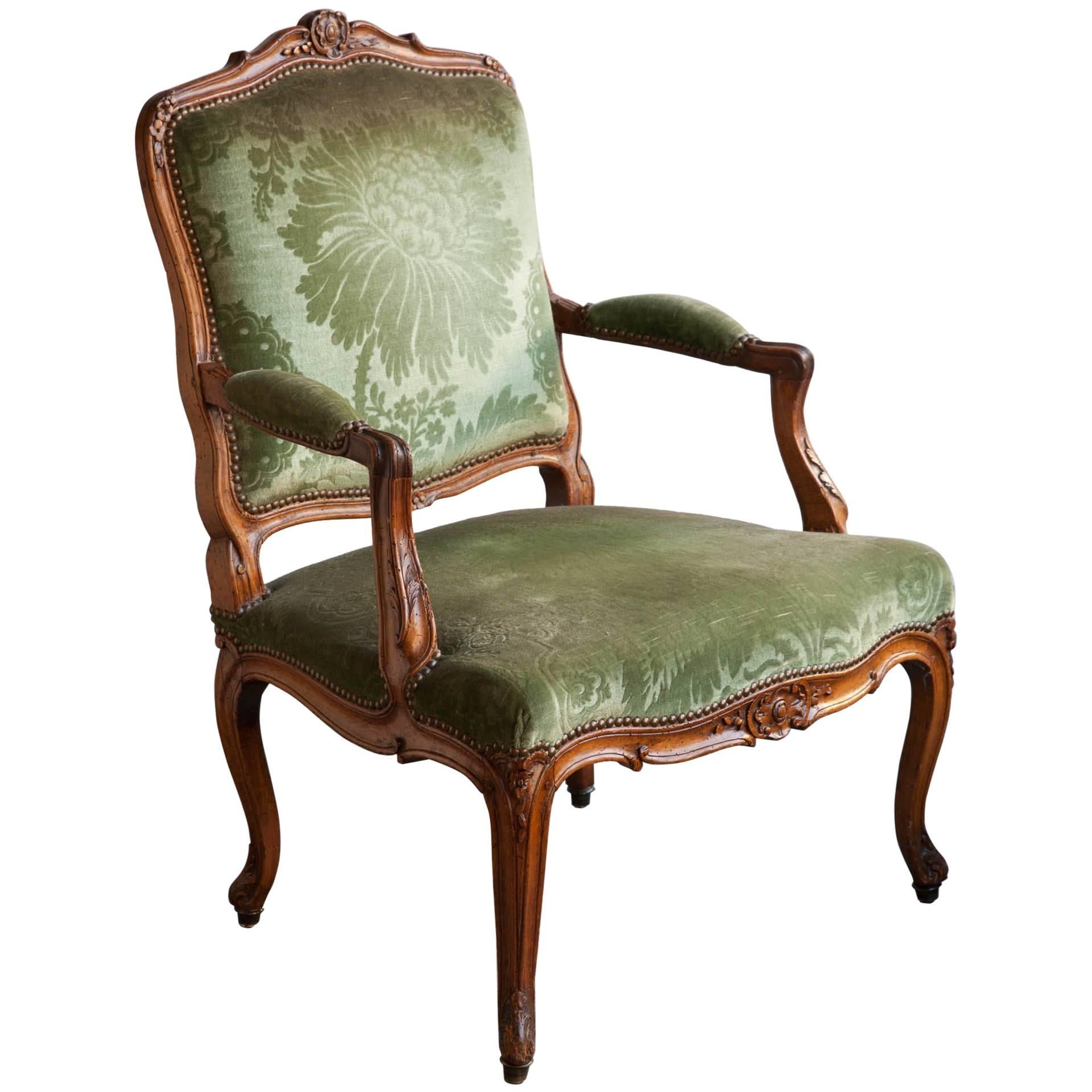 Carved Louis XV Walnut Fauteuil or Open Armchair, Mid-18th Century For Sale