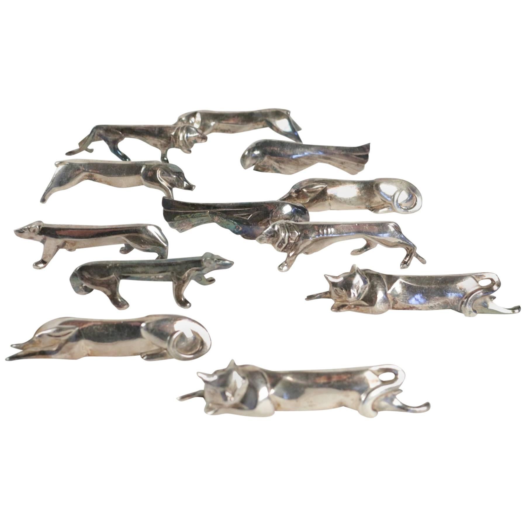 Set of 12 Christofle 
Gallia
 Metal Knife Rests