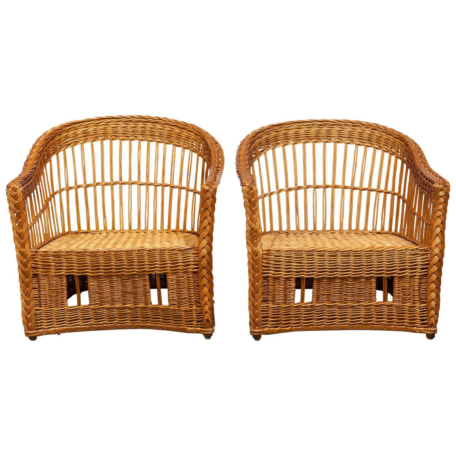 Pair of McGuire Rattan and Wicker Club Lounge Chairs and Ottoman