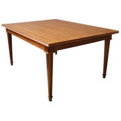A Fine French Art Deco Extendable Walnut Dining Table by Jules Leleu