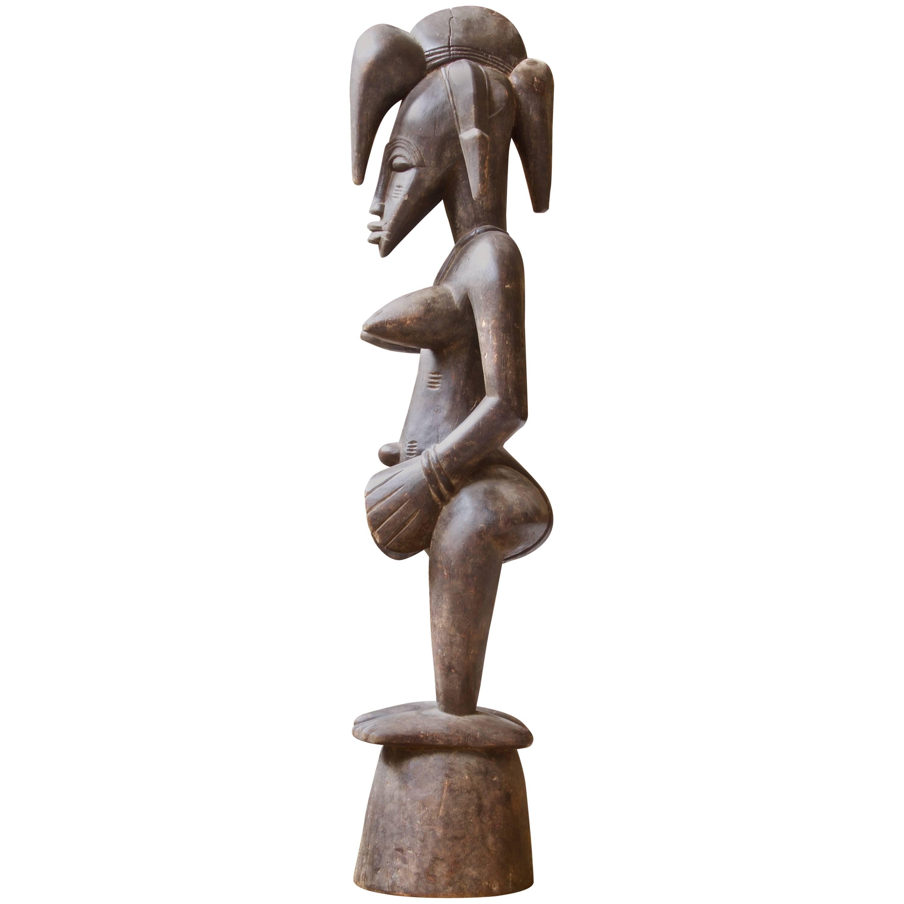Senufo Female Fertility Statue in Carved Wood, Late 19th Century For Sale