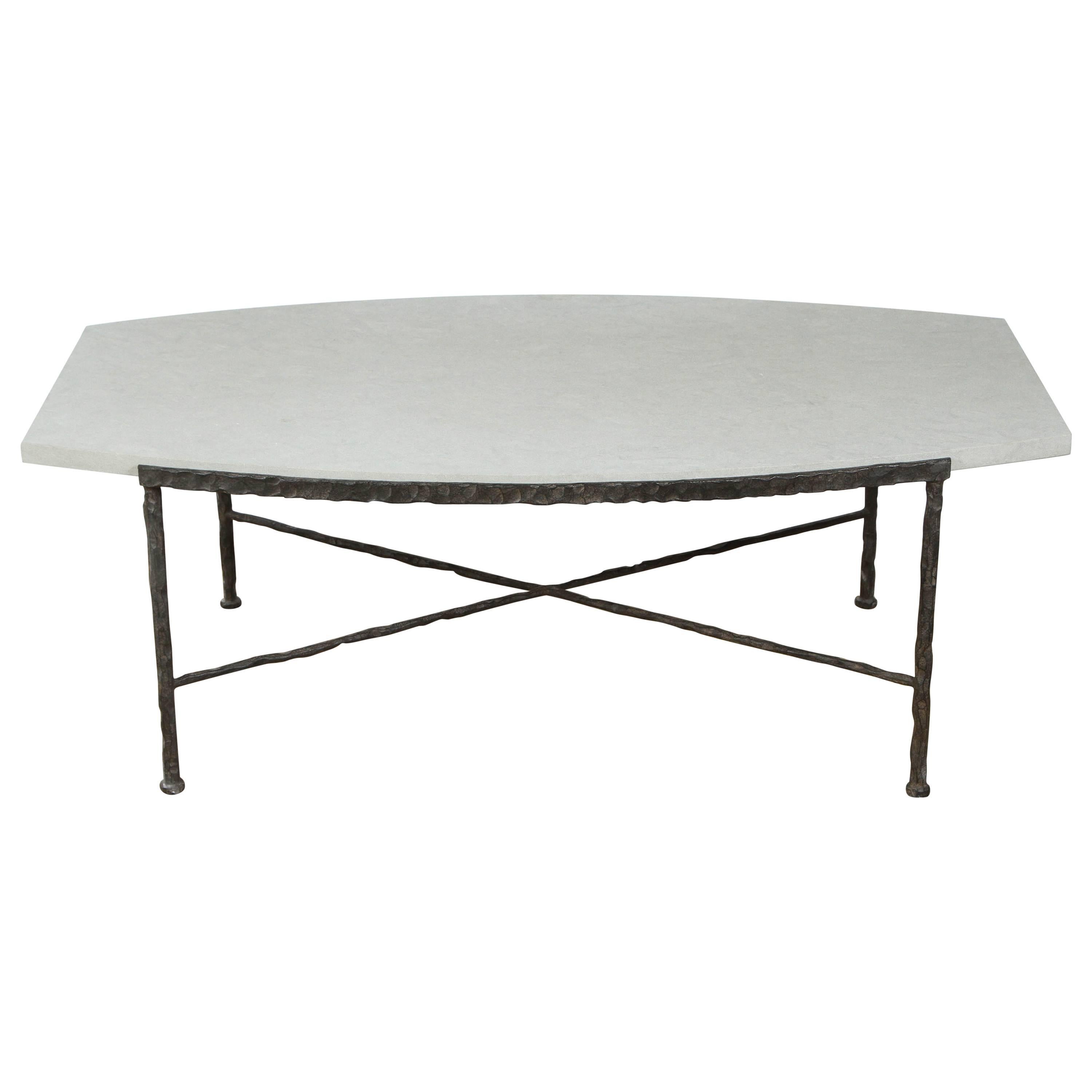 Paul Marra Ellipse Cocktail Table in Textured Iron and Bateig Blue Stone For Sale