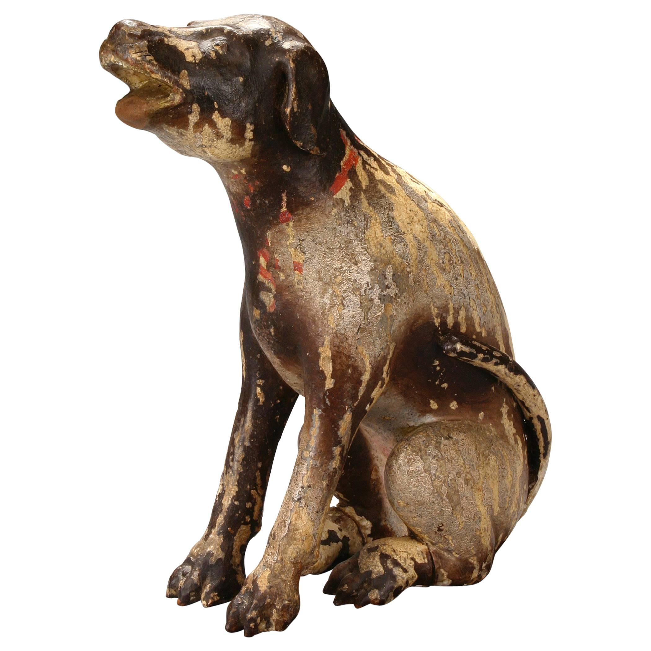 A Philippine Mottled Brown Painted Wood Carving of San Roque's Dog 