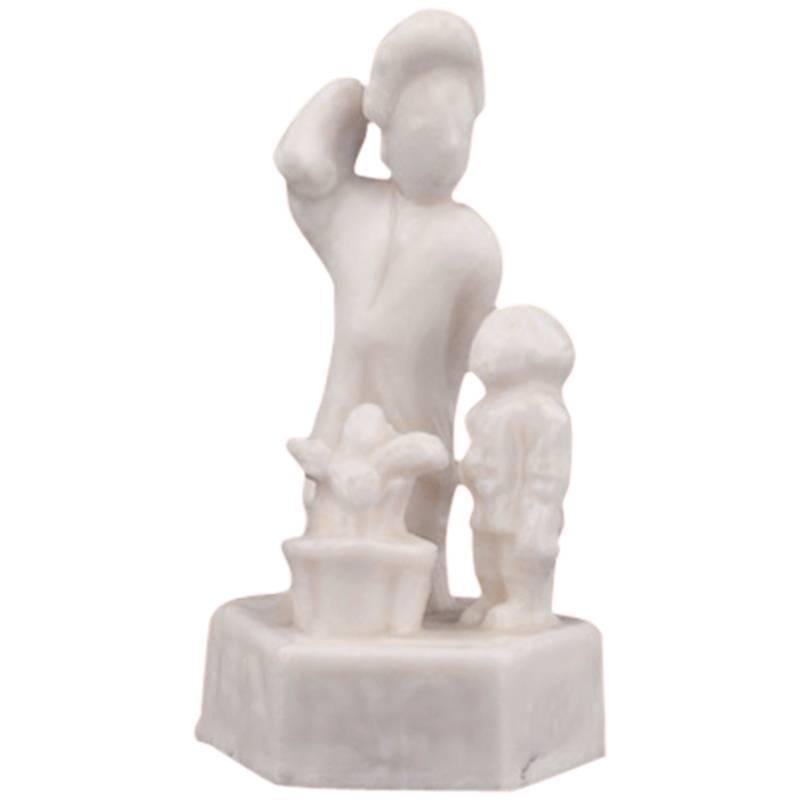 Blanc de Chine of a Miniature Lady, Flowering Plant and Attendant, 17th Century For Sale