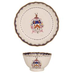 Chinese Porcelain Famille Rose Armorial Cup and Saucer, 18th Century
