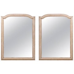 Pair of French Wood Mirrors Featuring an Arched Crest at the Top, Washed Finish