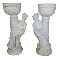 Paire de jardinières figuratives italiennes en marbre Carrera