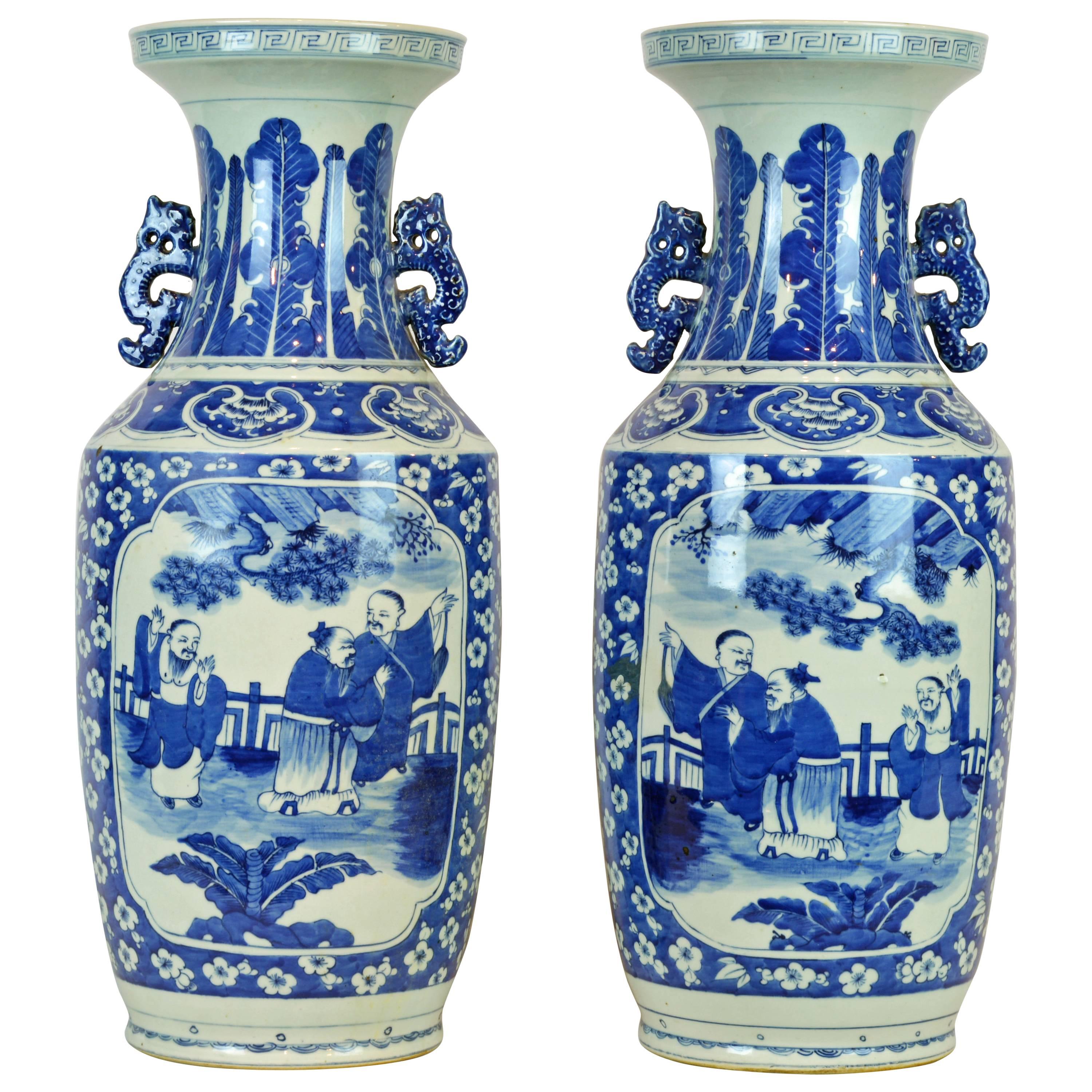 Pair of Kangxi Style Chinese Blue and White Dragon Handled Vases with Figures