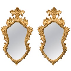 Pair of 1940s Italian Carved Gilt Wood Mirrors with Antiqued Glass