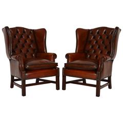 Pair of Antique Customizable Chippendale Style Leather Wing Armchairs
