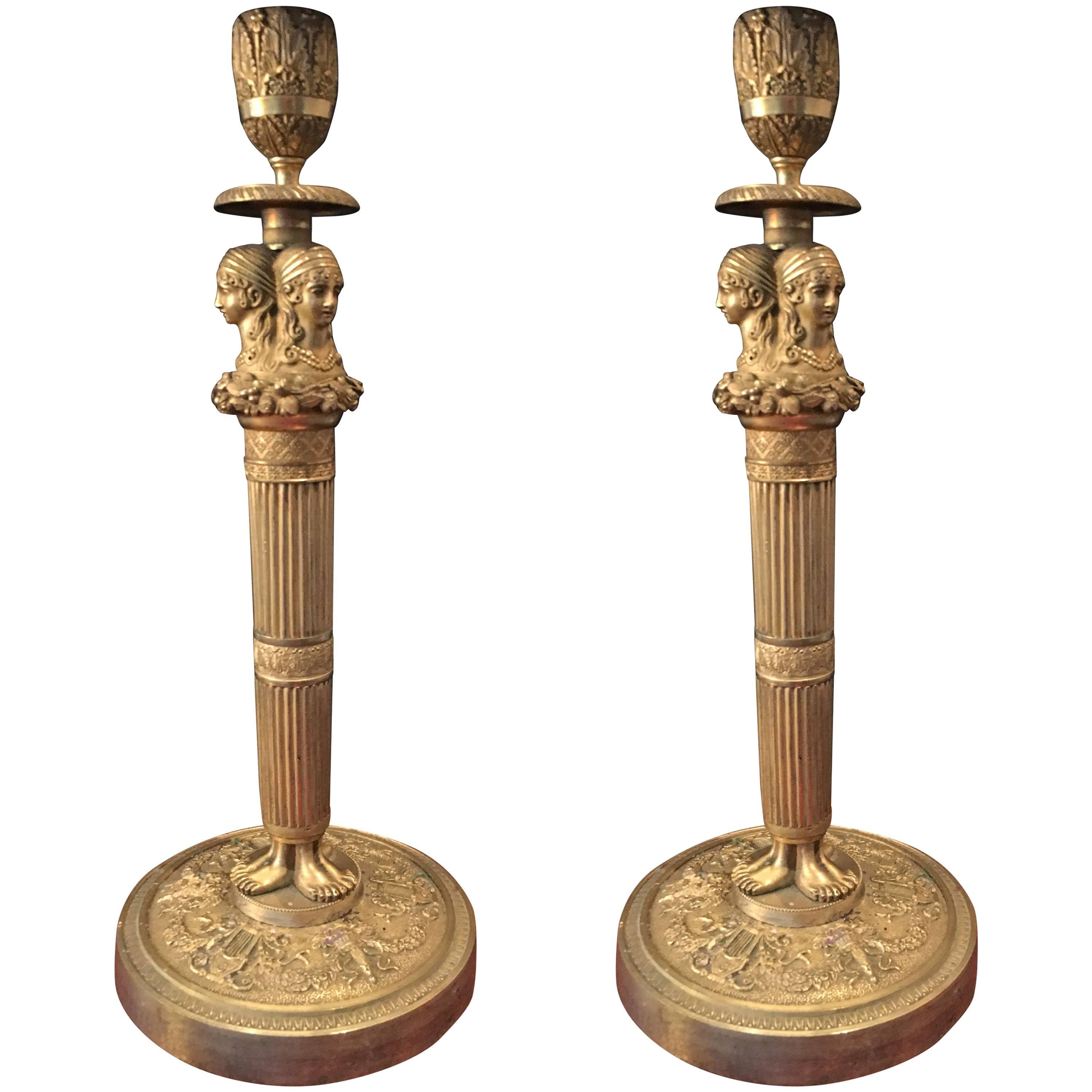 Pair of Gilded and Sculpted Bronze Candlesticks For Sale