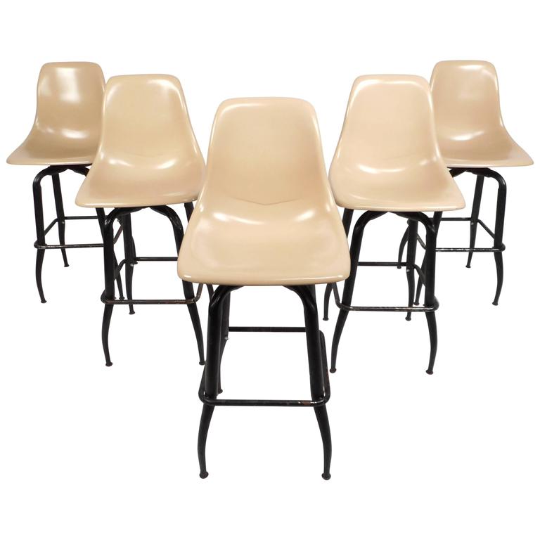 Set of MidCentury Modern Plastic and Iron Swivel Bar Stools For Sale