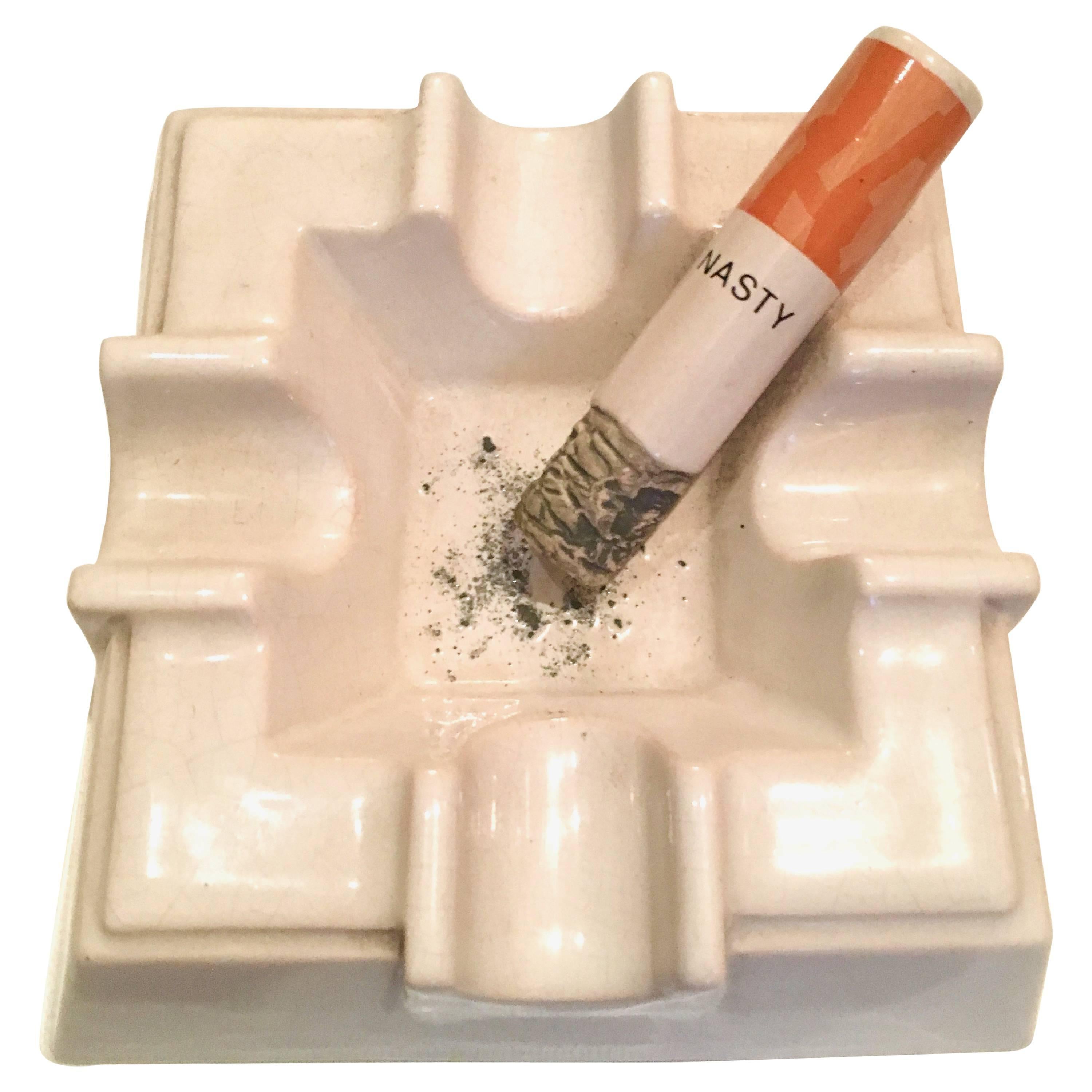 Sculptural Ceramic Ash Tray with "Nasty" Cigarette