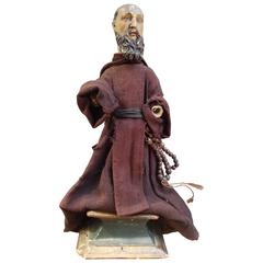 Antique Carved Monk Statue with Original Cloth Garments and Wood Beaded Belt