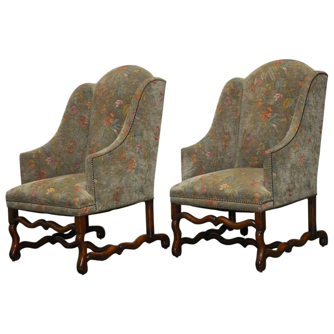 Pair of Walnut Os De Mouton Upholstered Wingback Chairs
