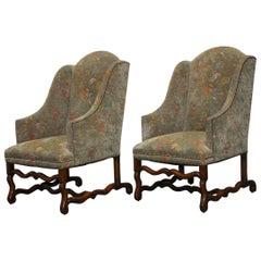 Pair of Walnut Os De Mouton Upholstered Wingback Chairs