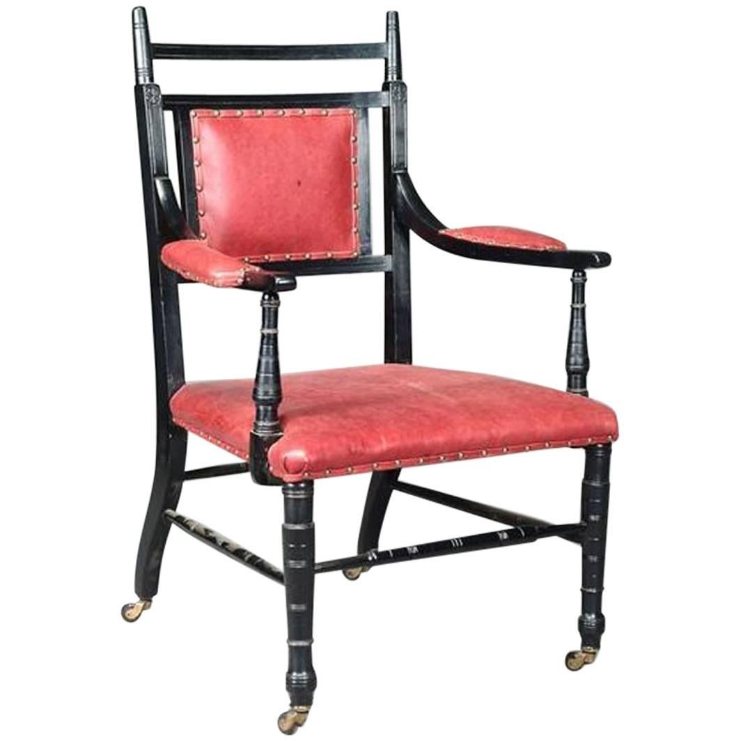 Ebonized Upholstered Armchair Made by Oetzmann, After a Design by E.W. Godwin For Sale