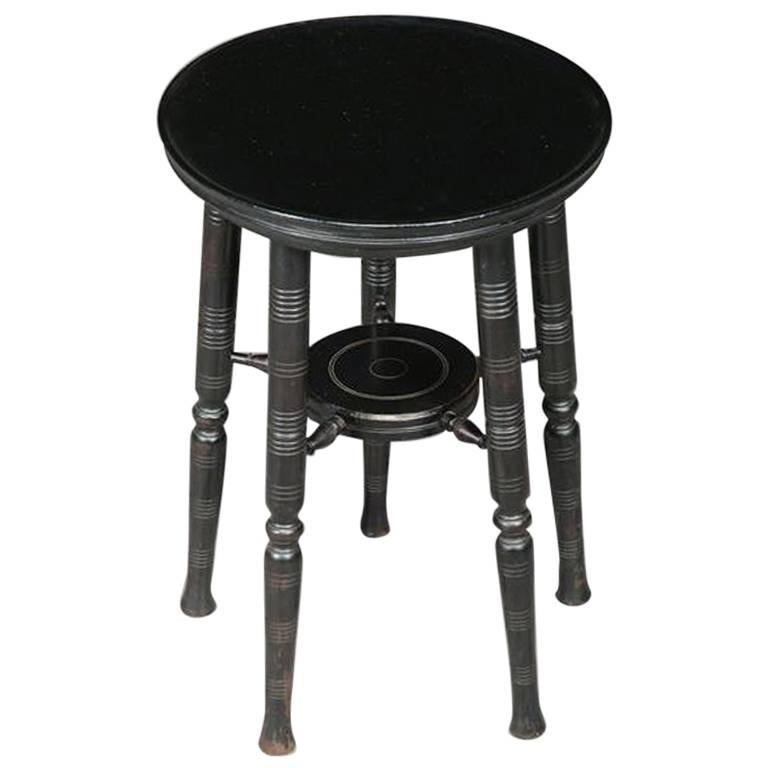 E W Godwin Attri. Aesthetic Movement Circular Wine or Side Table with Five Legs.