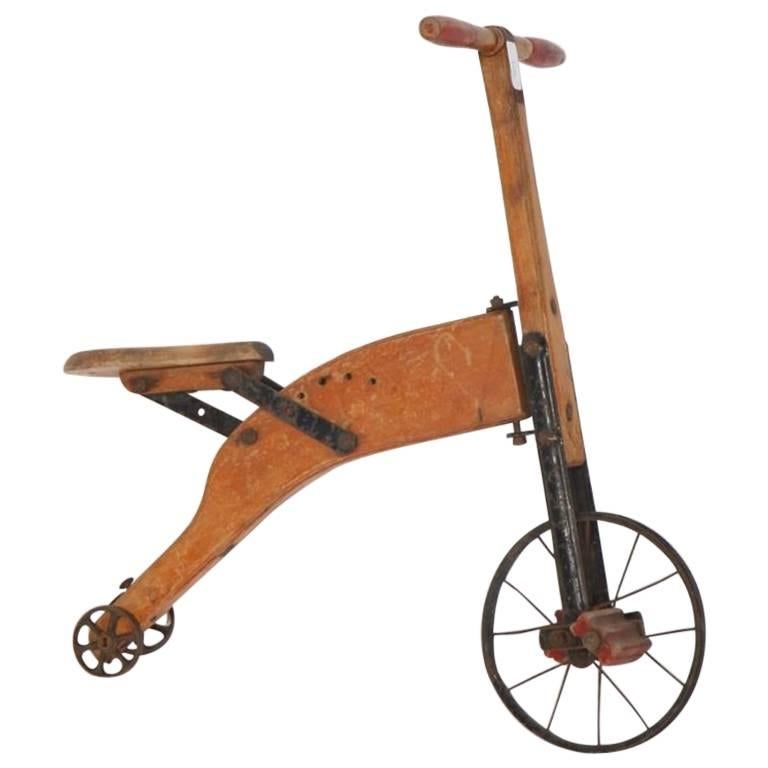 19th Century, Little Bicycle Made of Solid Wood with Metal Wheels For Sale