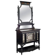 Lamb of Manchester. An Aesthetic Movement Ebonized and Coromandel Side Cabinet