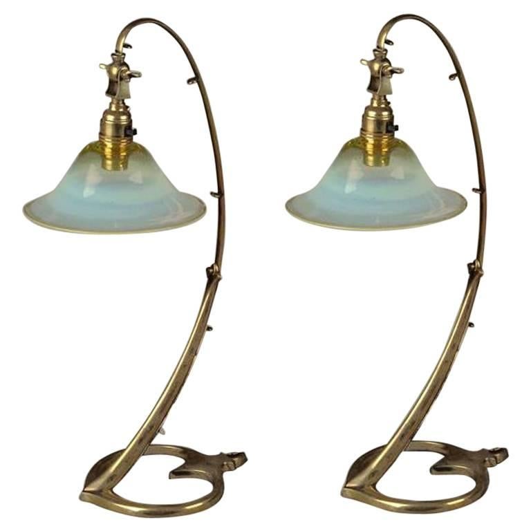 William Arthur Smith Benson (1854-1924), a pair of Arts and Crafts brass table lights in the style of Swans.

I always have a large collection of WAS Benson table lights in stock.
At present I have two more pairs of Swan lamps and a very rare pair