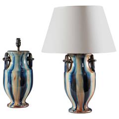Pair of Polychrome Pottery Lamps