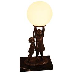 Vintage French 1930s Orb Sculpture Lamp Depicting Children Playing