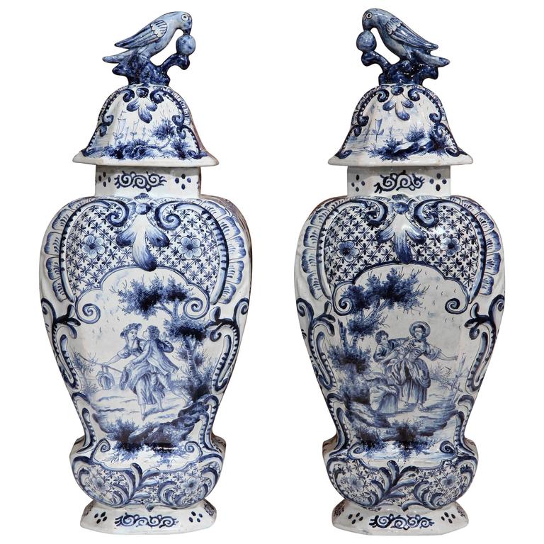 Pair of 19th Century HandPainted Blue and White Delft Vases with Lids