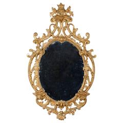 George III Chippendale Period Carved Giltwood Oval Mirror