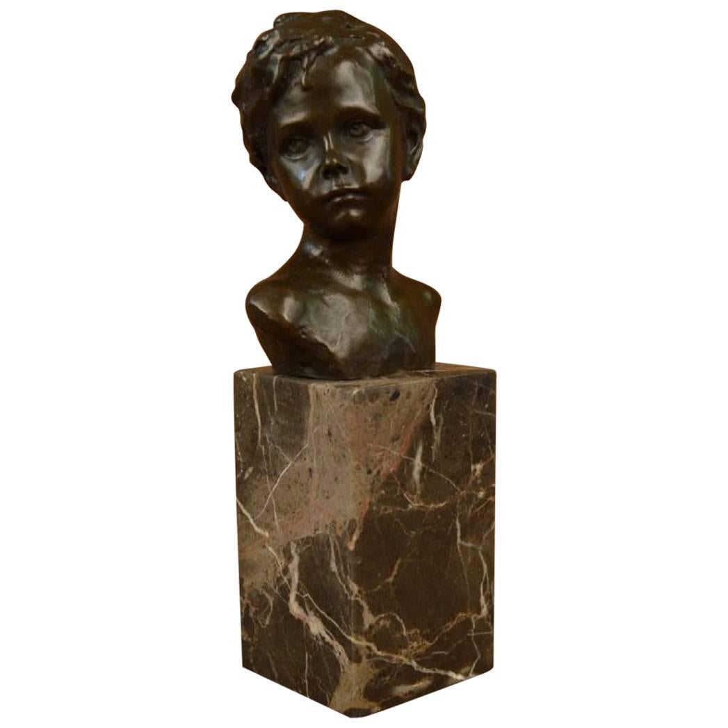 Art Deco Styled Bronze Bust of Young Boy Mounted on Marble Block Base For Sale