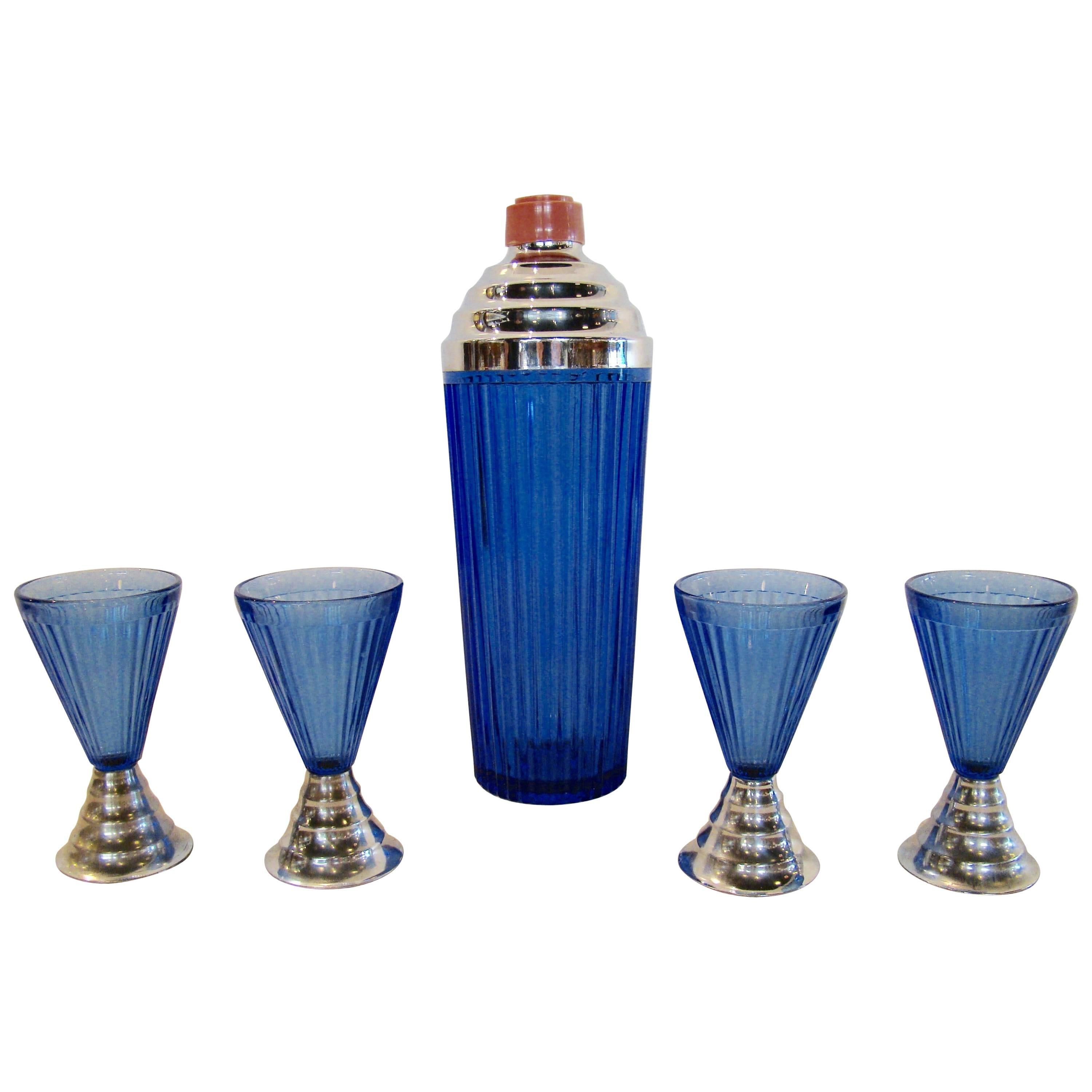 Art Deco Machine Age Cobalt Ribbed Cocktail Shaker and Four Cups, circa 1930s