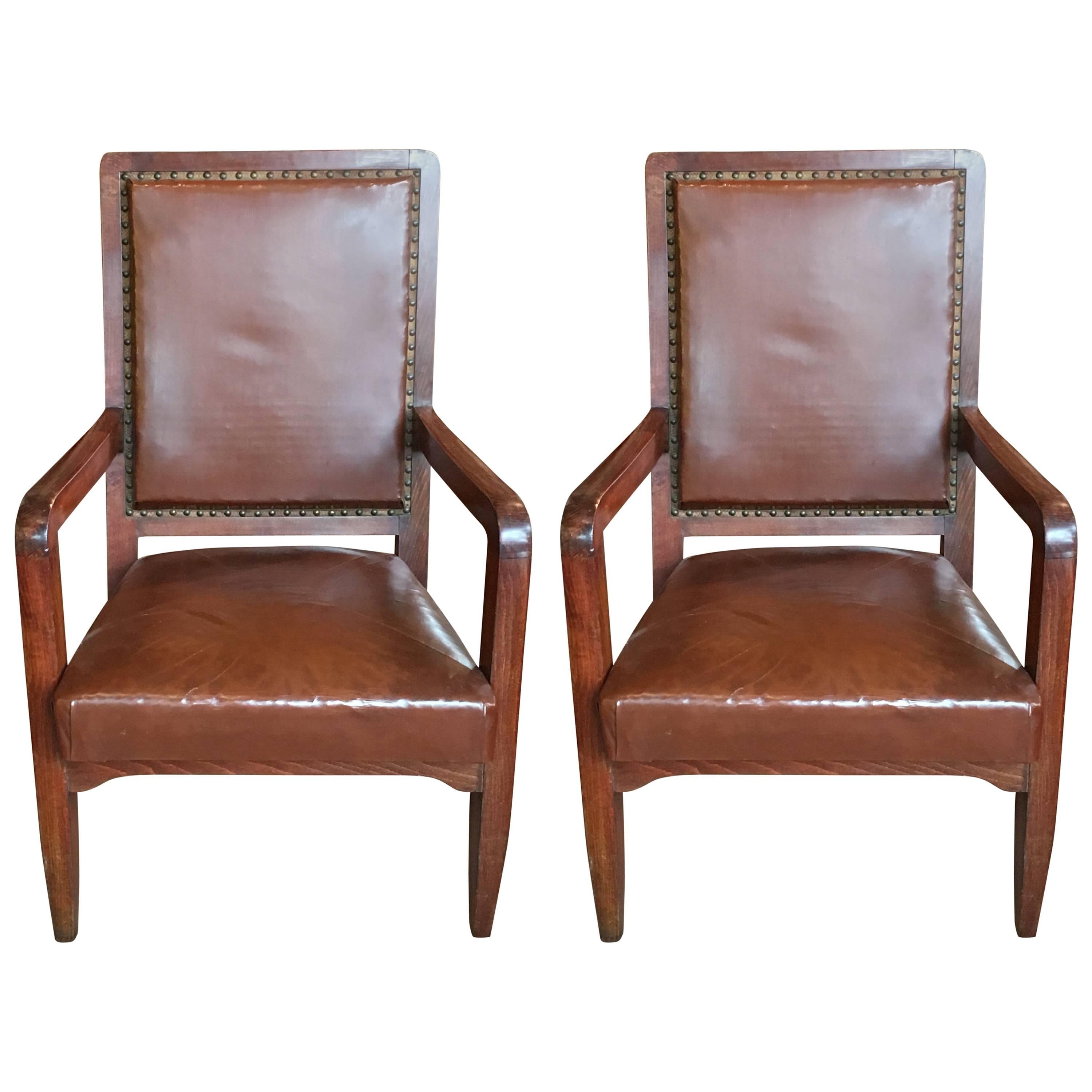 Pair of French walnut library chairs with original boxed back and horsehair upholstery; Substantial and sturdy, stamped with unidentified makers numbers.
Avantgarden Ltd. cultivates unexpected and exceptional lighting, furniture and design.  To view