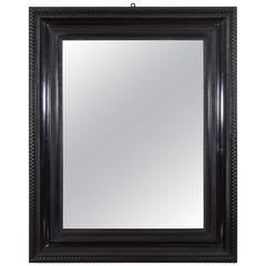 Italian Baroque Style Carved and Ebonized Walnut Mirror, 19th Century