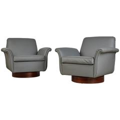 Pair of Brazilian Modern Grey Leather and Rosewood Swivel Armchairs, circa 1960