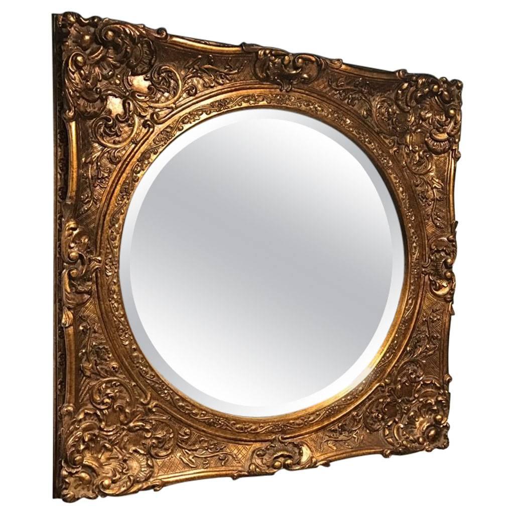 Giltwood Mirror with Ornate Details For Sale