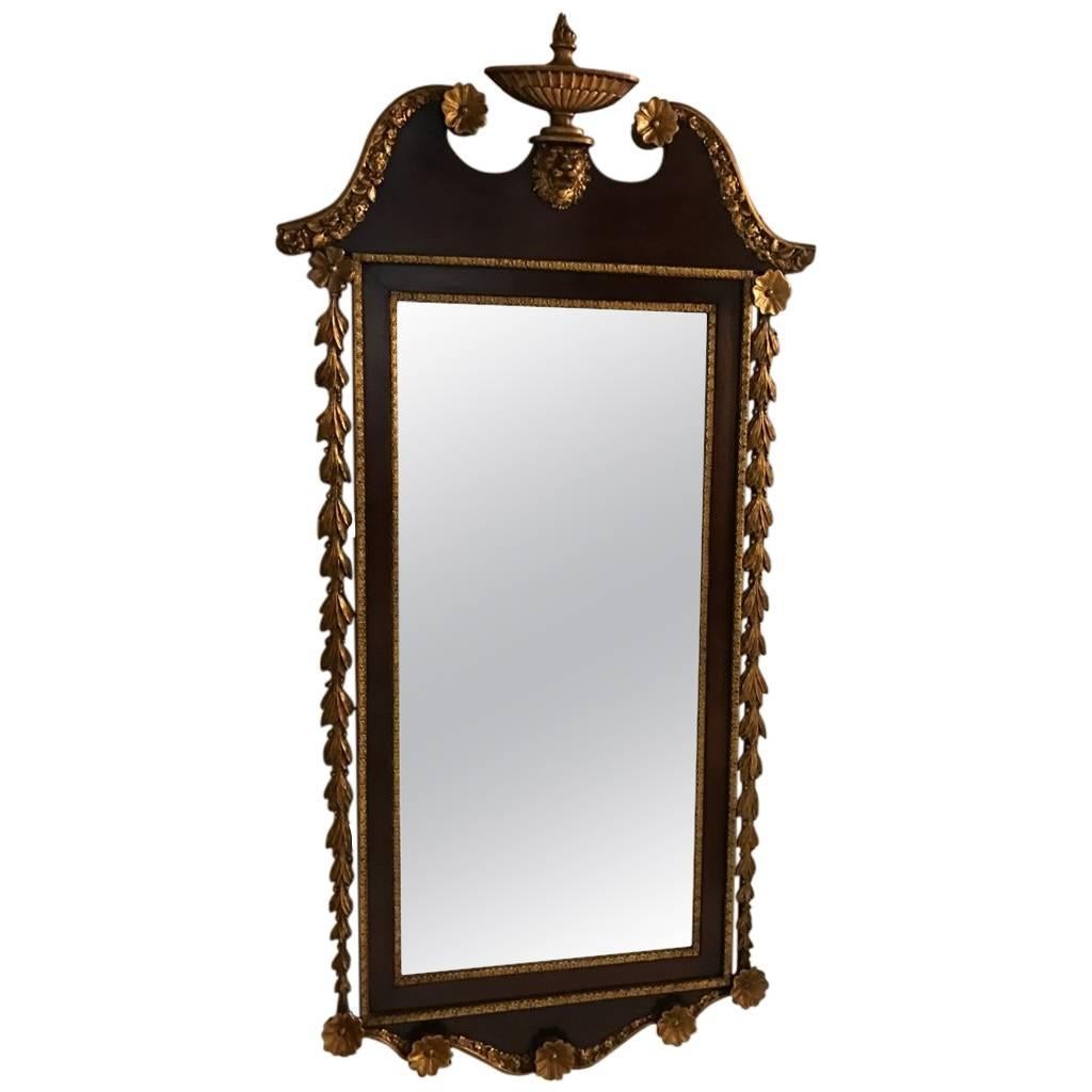 Miroir en bois doré et acajou en vente